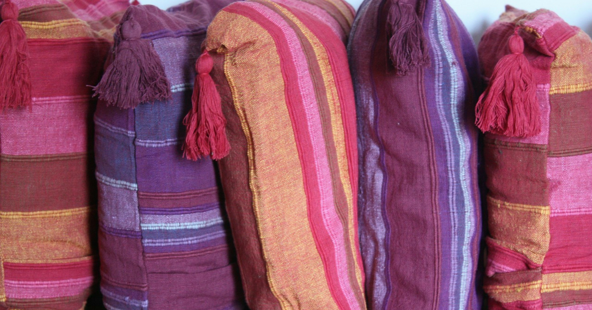 Get Cushiony with colourful pom poms